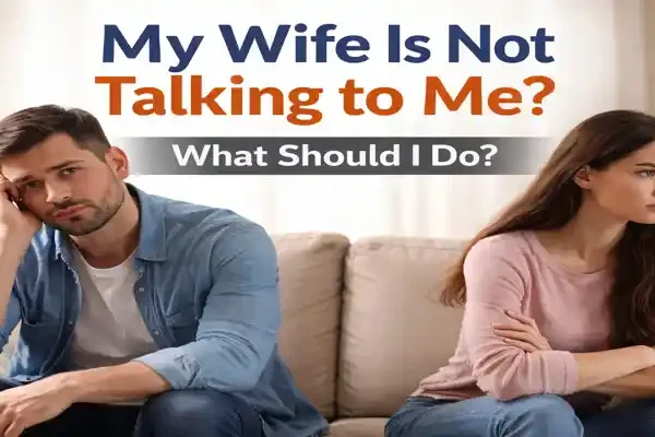 Couple sitting apart after an argument, showing relationship communication problems